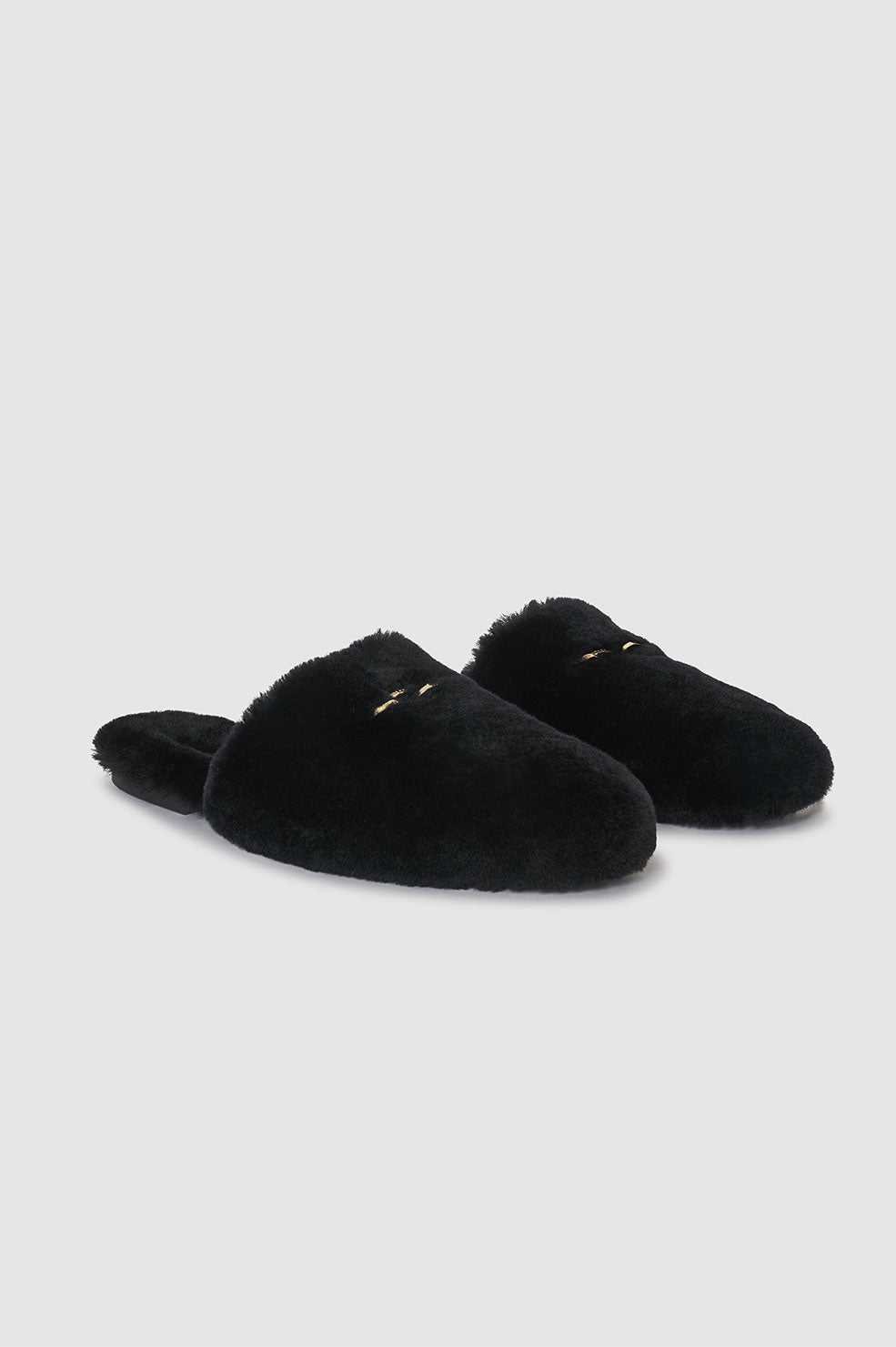 Anine Bing Shearling Mules in Black Blond Genius