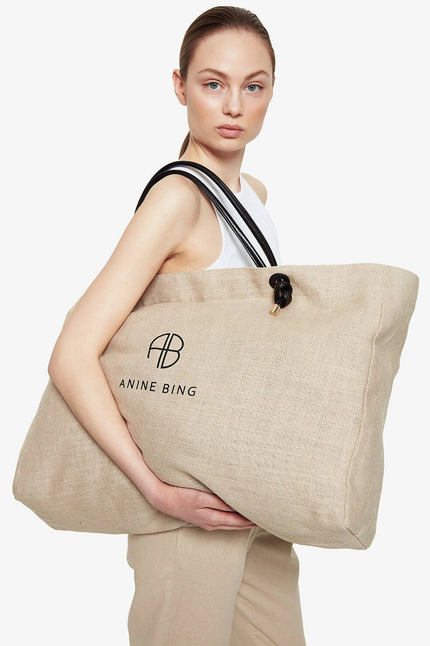SHOP-LABEL.COM - @aninebing Saffron tote bag is the perfect summer  carry-all bag. Large sized tote available in brown and medium sized tote  available in black!